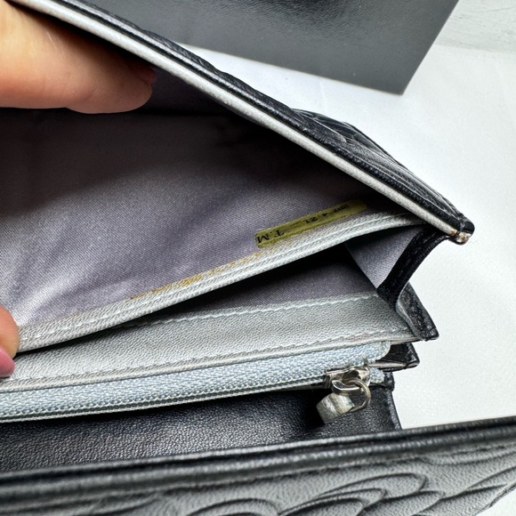 CHANEL 
Caviar Camellia Embossed Flap Wallet Black - Picture 12 of 14